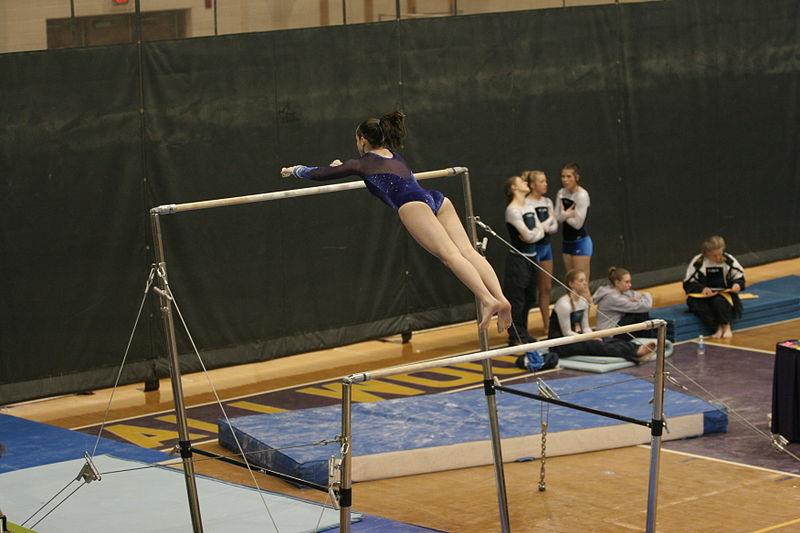 Gymnist on Uneven bars