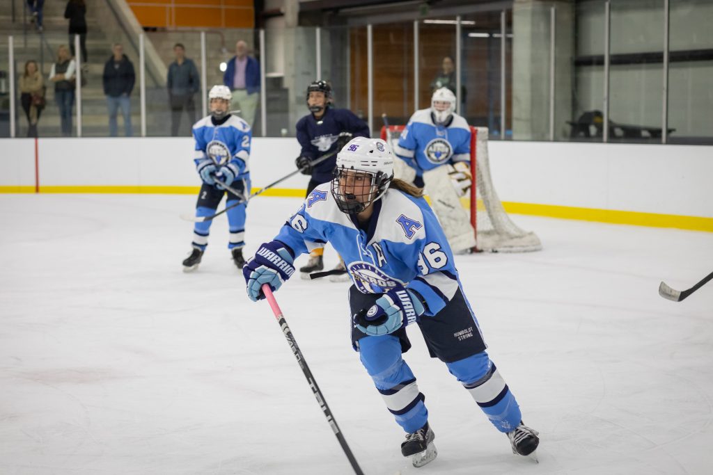 Women's ice hockey being played at FivePoint Arena. Photo by Michelle McCoy.
