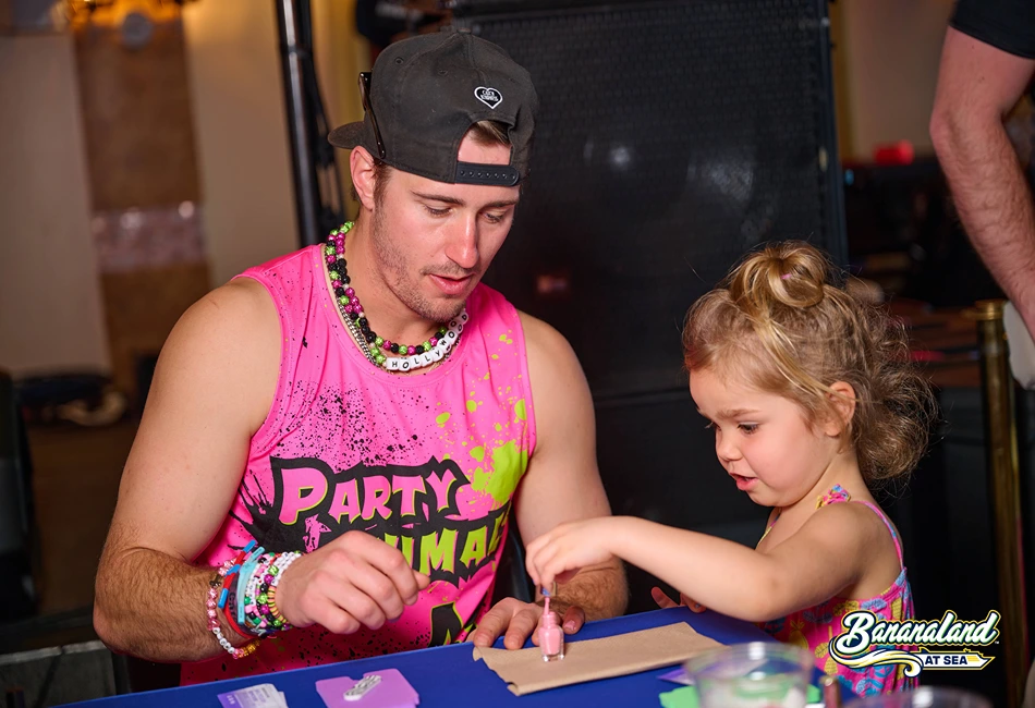 One of the Party Animals signs autographs for fans. Photo courtesy of the Savannah Bananas